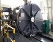 Large circular industrial chamber in a workshop