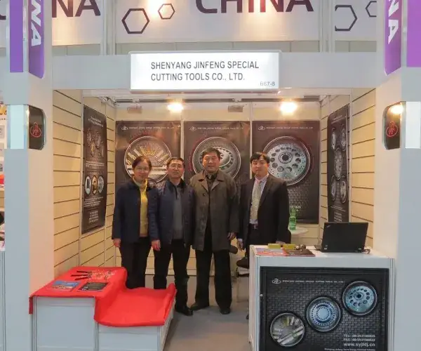 Visitors standing at a JINFENG exhibition booth