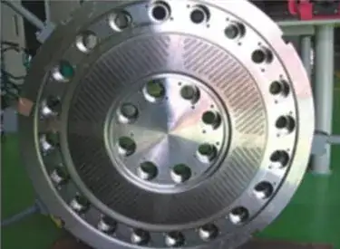 Machined circular die plate with an inner perforated ring