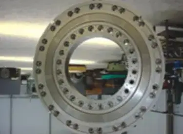 Ring-shaped die plate on a workshop floor