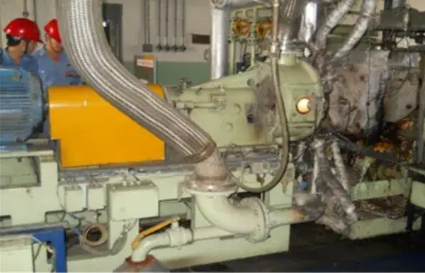 Pelletizer housing and connected piping