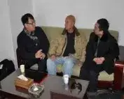 Visitors talking in a seating area