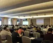 Attendees seated in a conference room