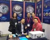 Visitors gathered at a JINFENG die plate display